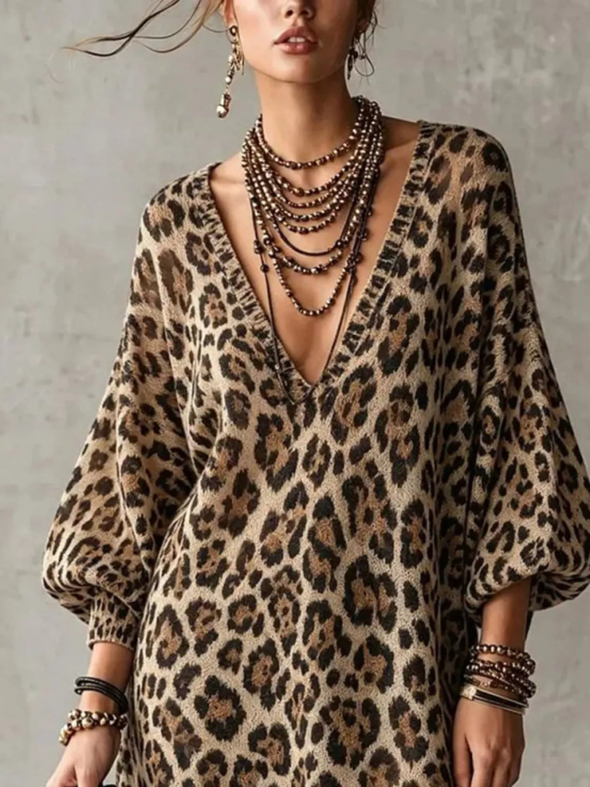 Leopard print V-neck mini dress with lace-trim hem and billowy sleeves