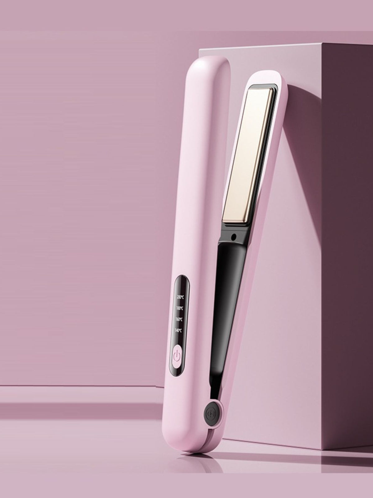 Blush pink portable hair straightener side view with heat control panel and power button