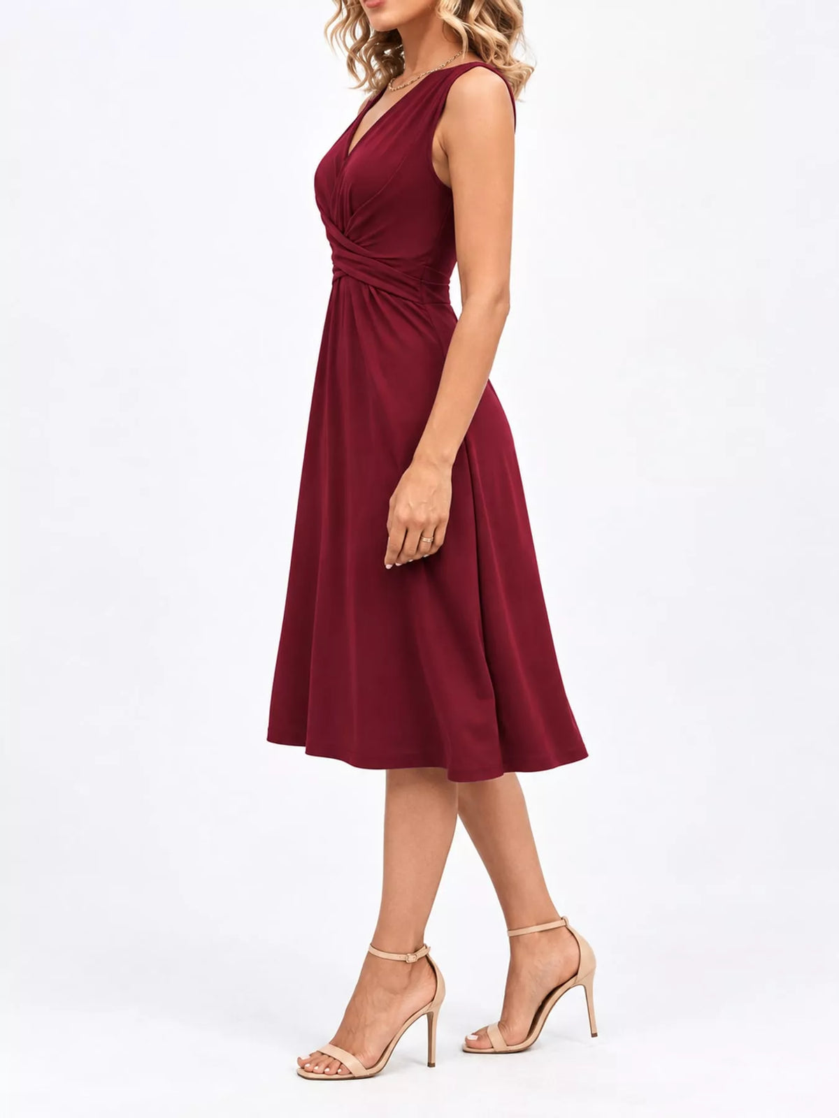Burgundy sleeveless midi dress, side view, draped crisscross waist