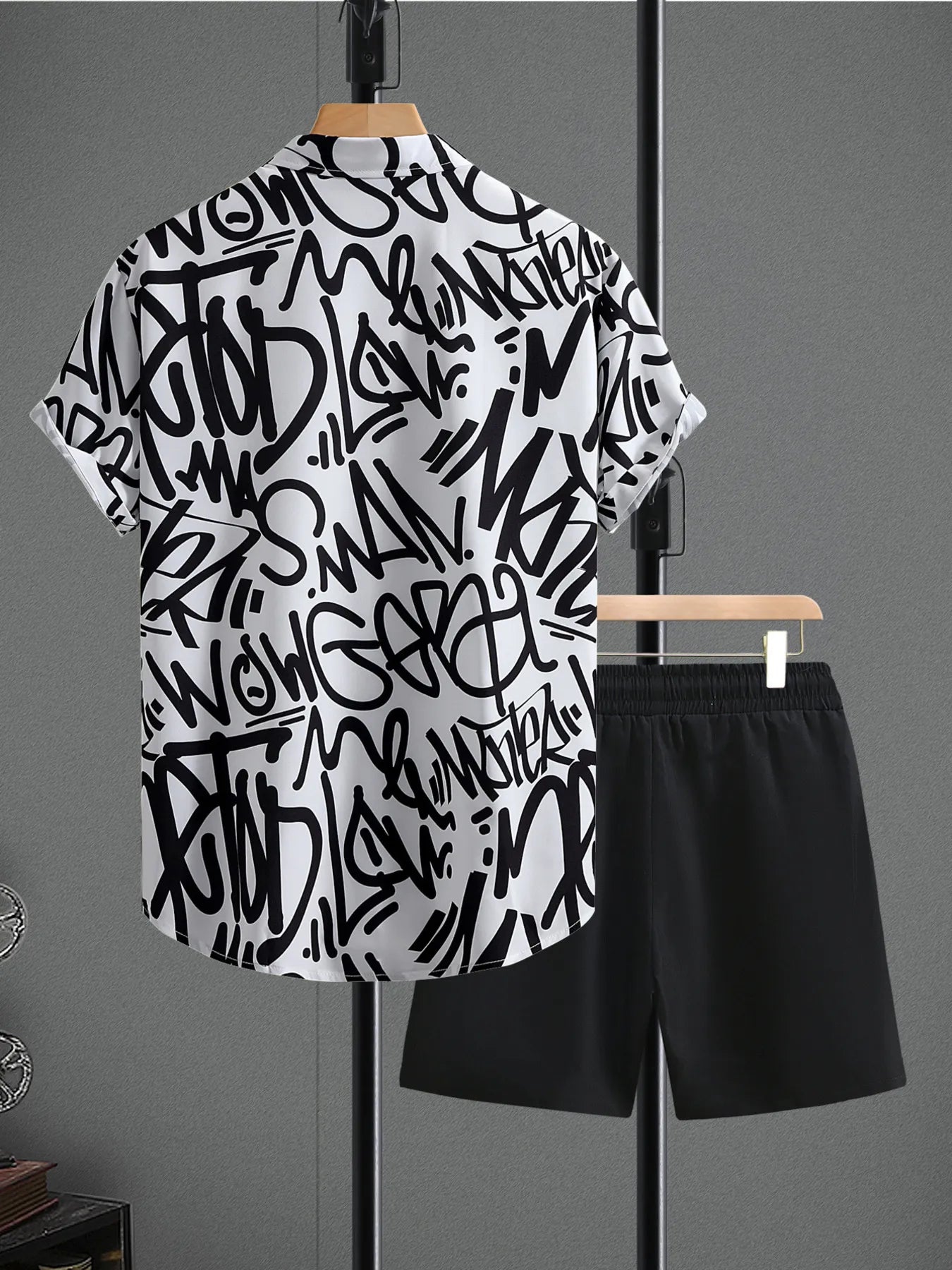 Letter print shirt and shorts set, back view: black-and-white shirt with black shorts
