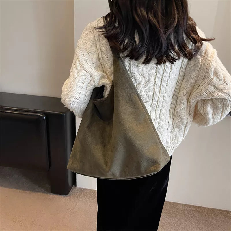 Olive green shoulder bag with wide strap and open top
