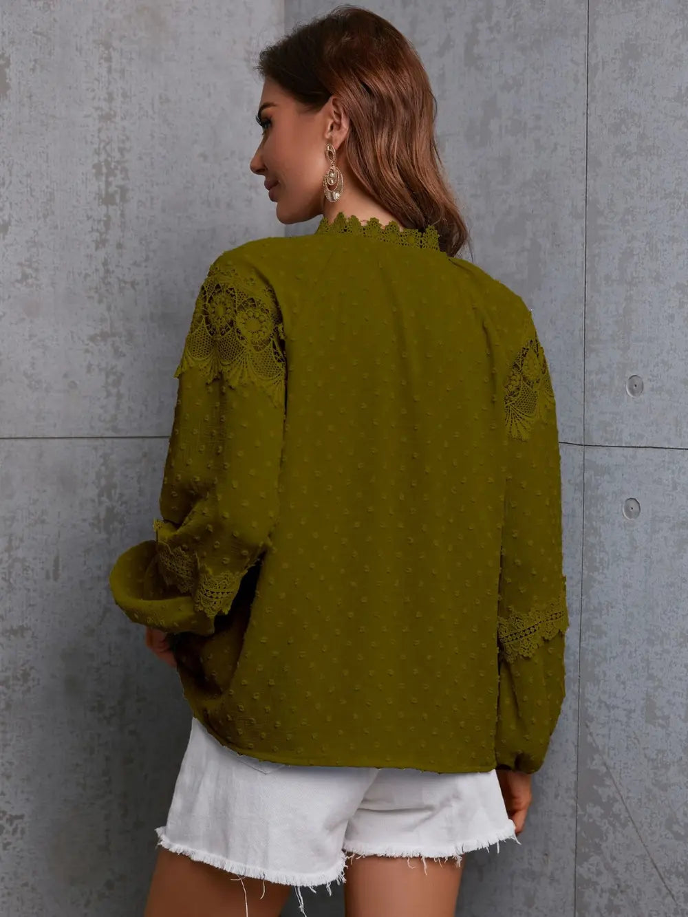 Moss green crochet blouse back view with long sleeves and lace cuffs