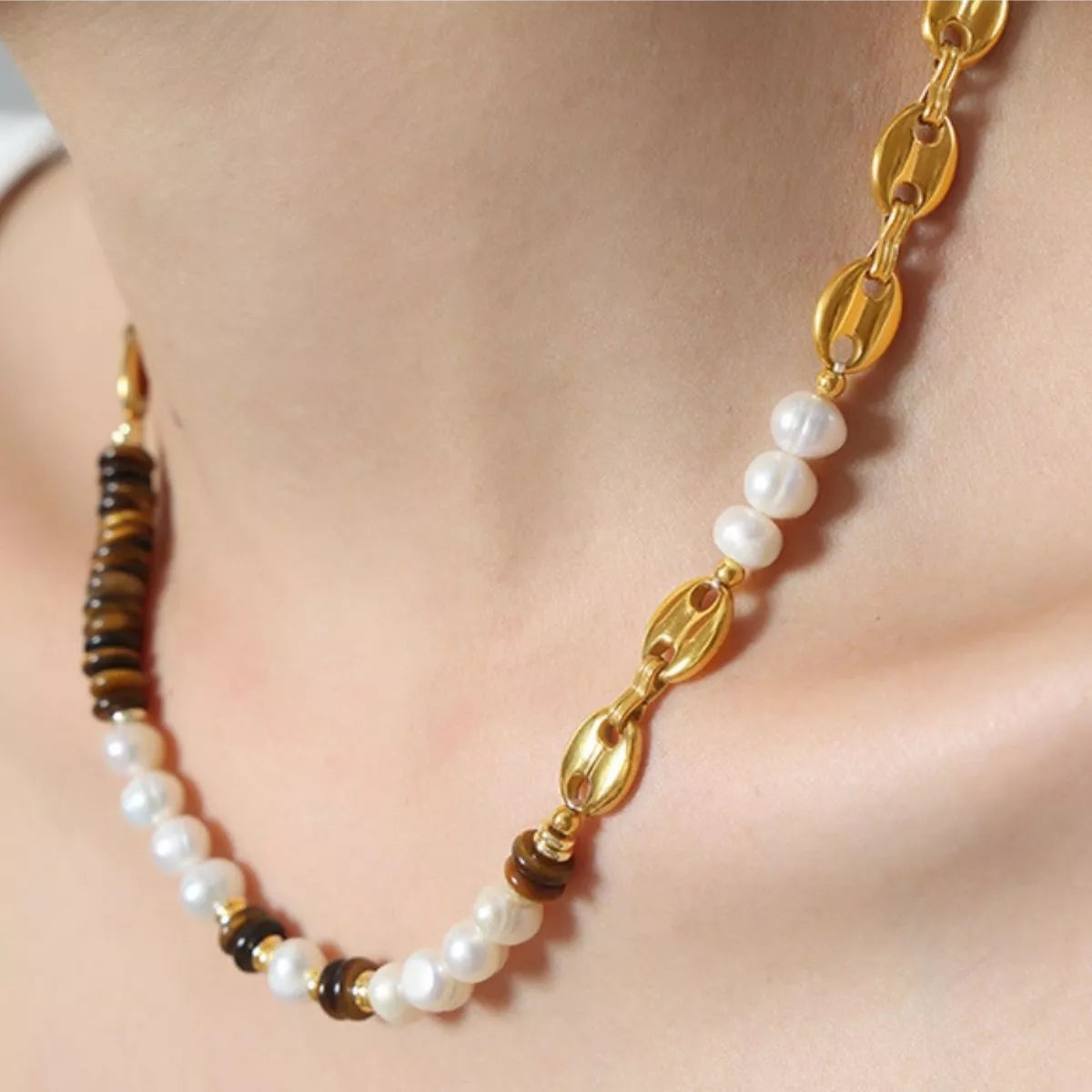 Gold link necklace with freshwater pearls and tiger eye striped beads