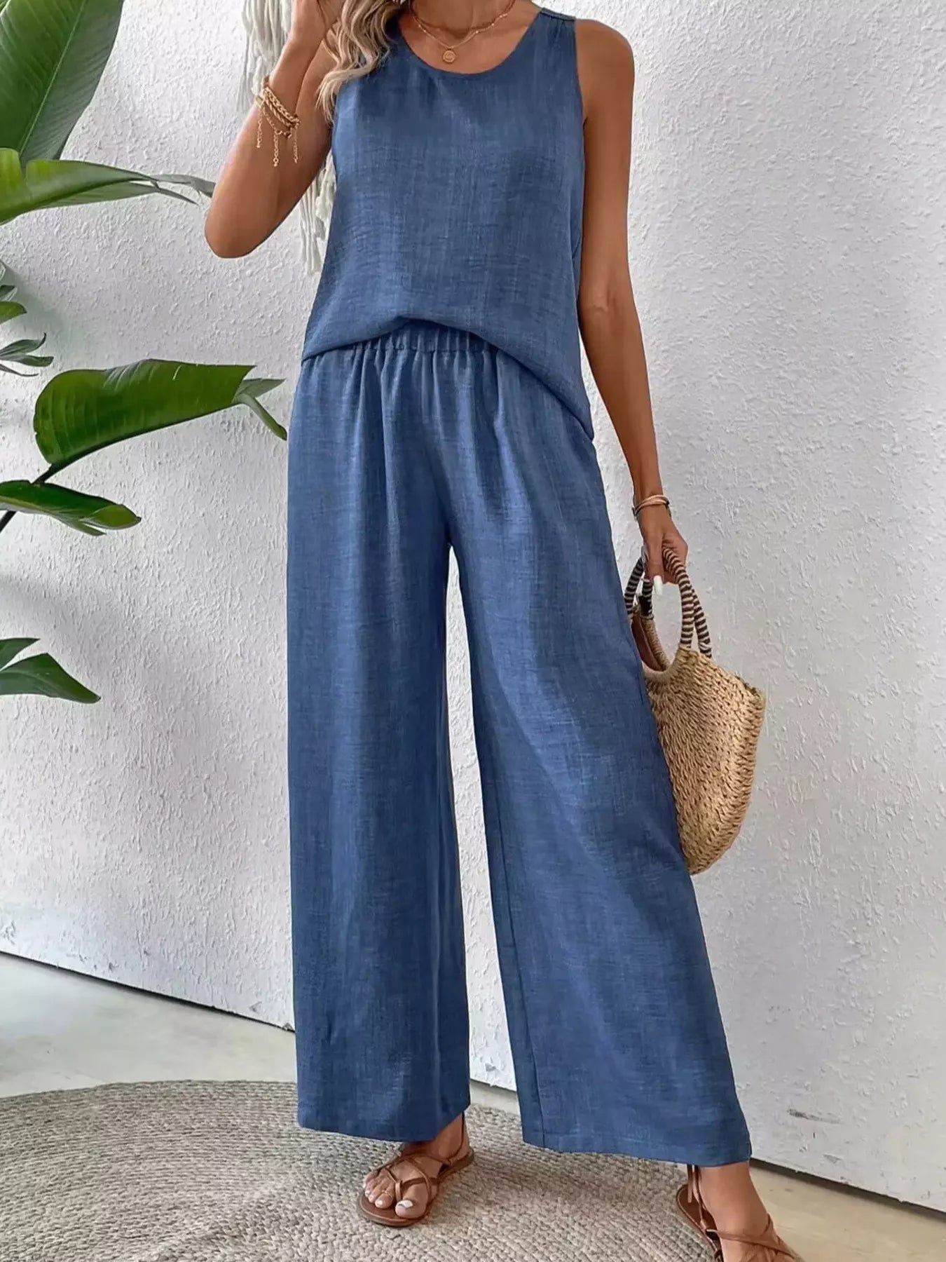 Blue round-neck sleeveless tank and wide-leg pants set with smocked waist.