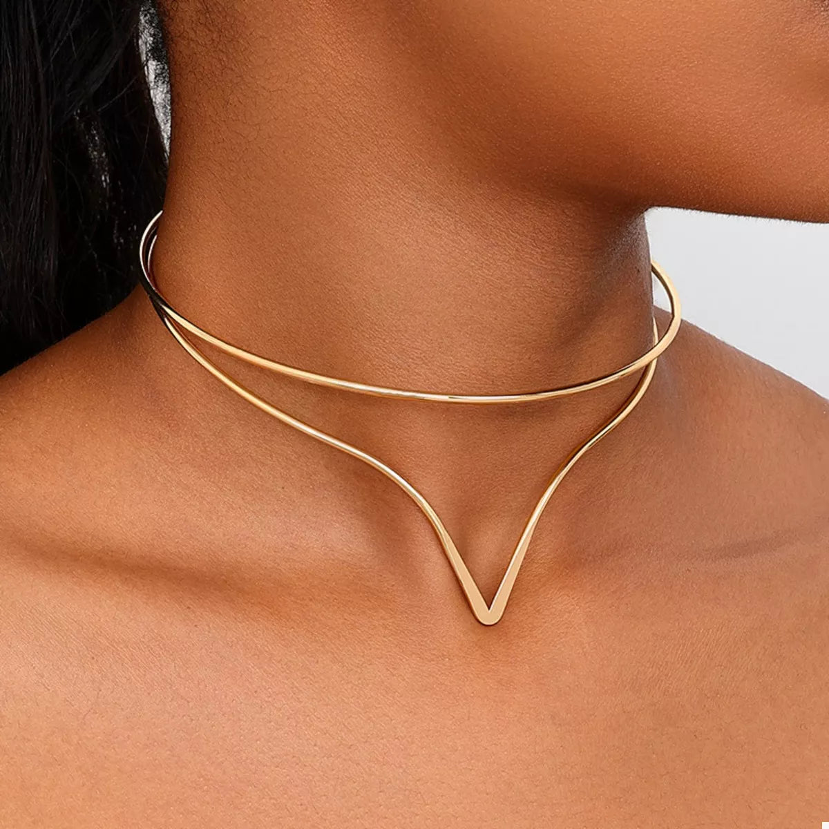 Gold double-layer V-shaped choker necklace with two thin wire-like bands