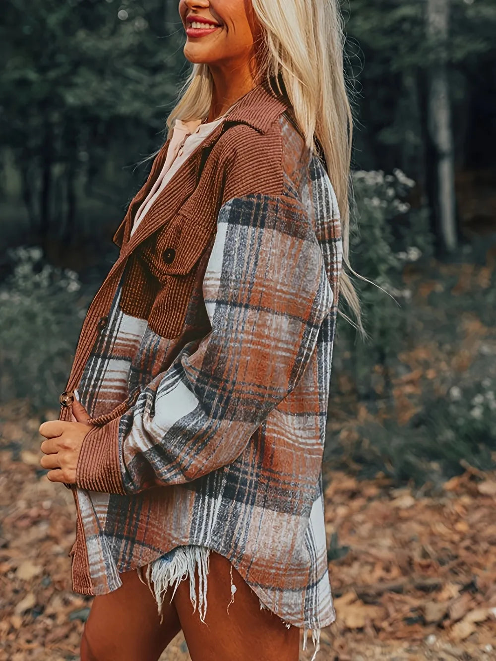 Brown plaid button-up shacket with collared neck, long sleeves, frayed hem and cuffs