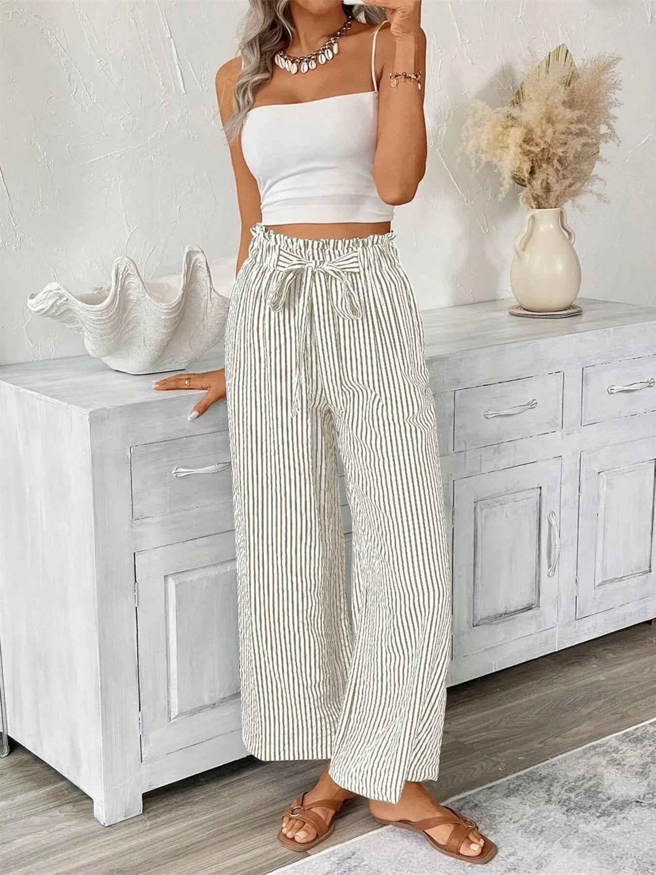 Striped wide-leg paper bag pants with elasticized tie waist, cream and dark vertical stripes