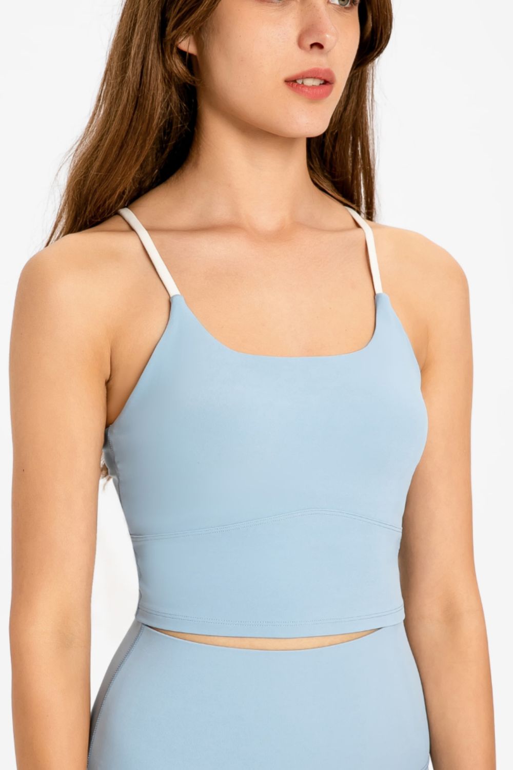 Sports cami with crisscross open back and scoop neckline, light blue