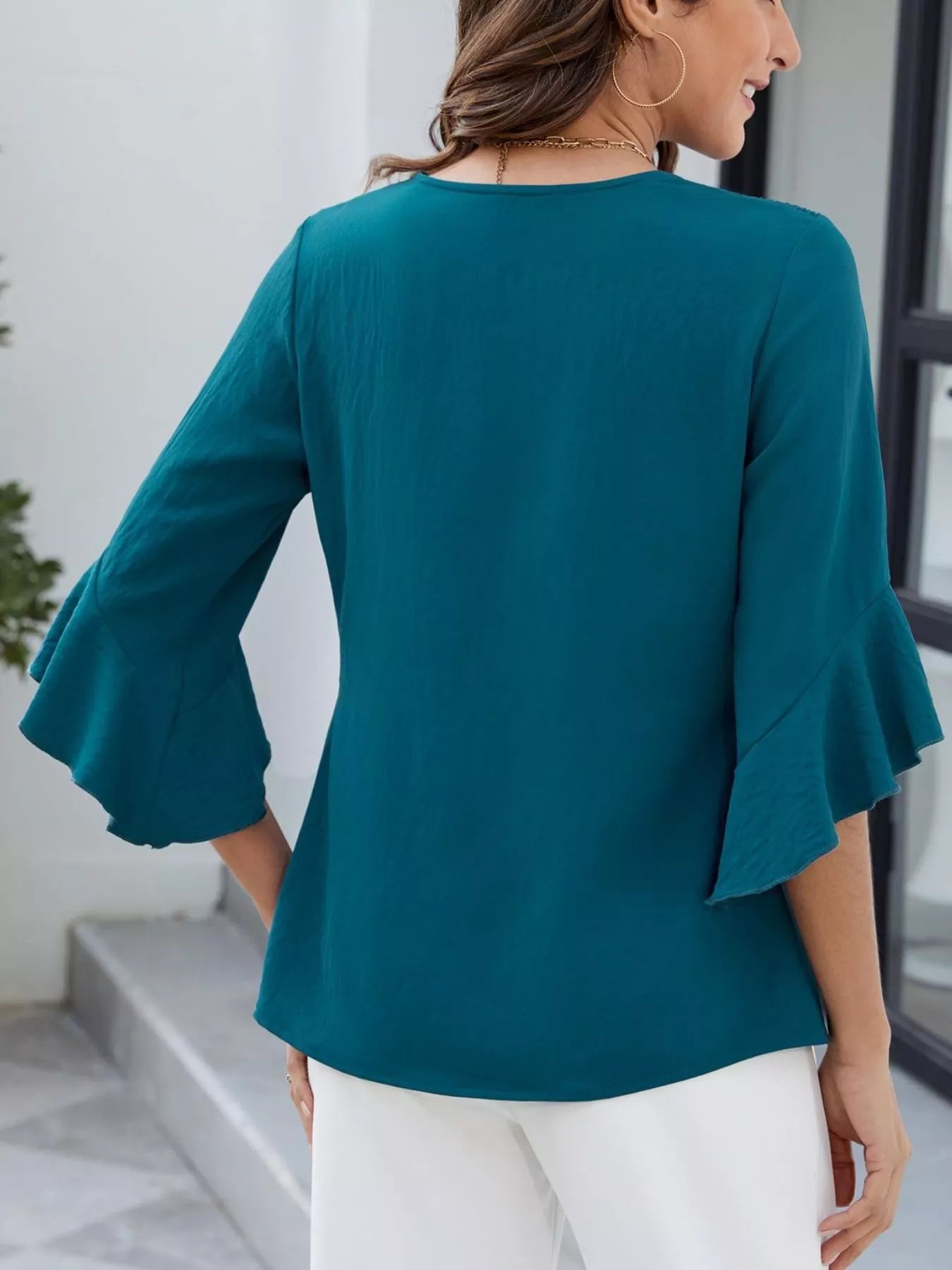 V-Neck Ruffle Sleeve Blouse in teal, bell sleeves, back view, Trendsi