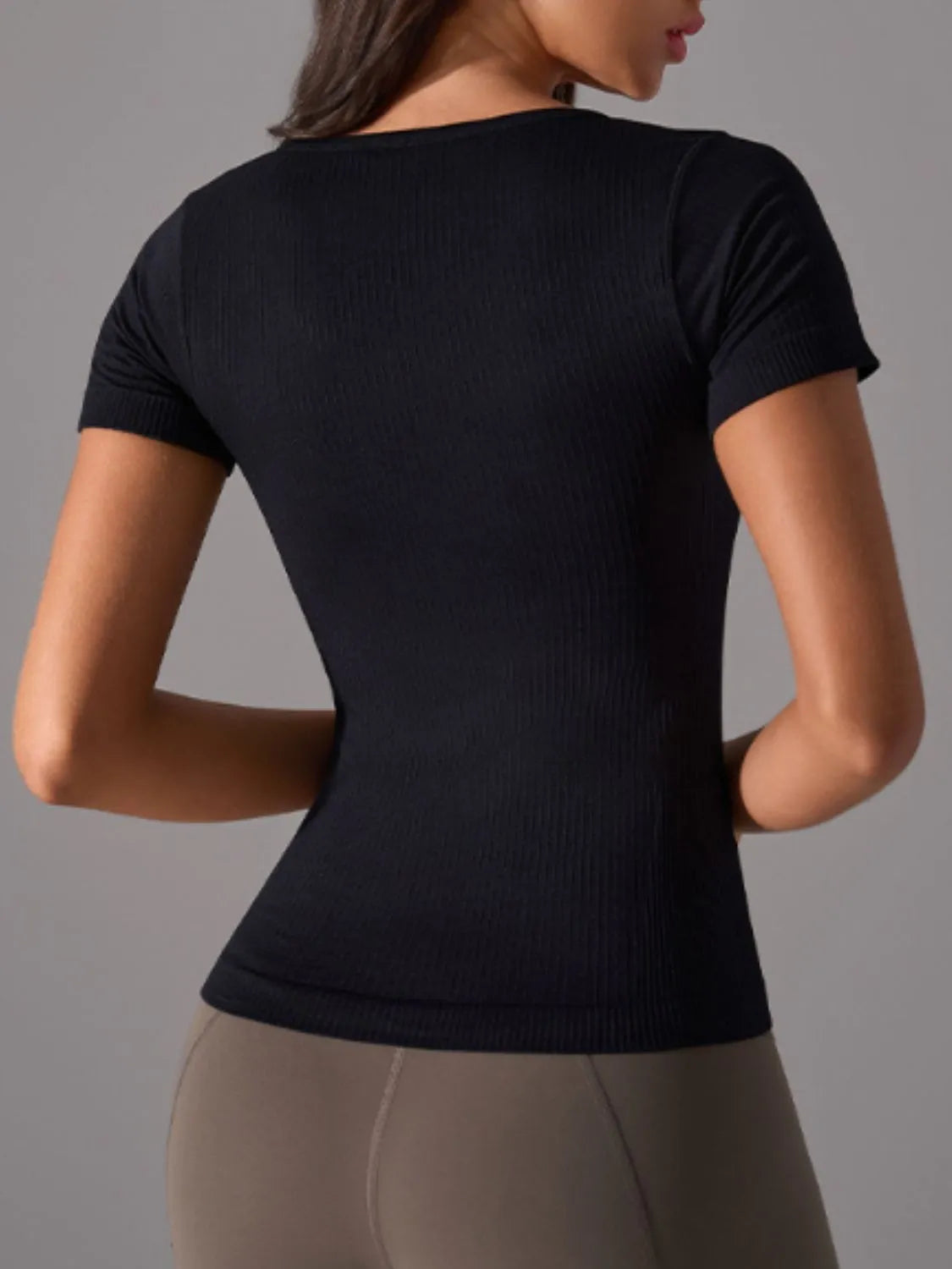 Black square-neck active t-shirt with short sleeves, fitted stretch knit, back