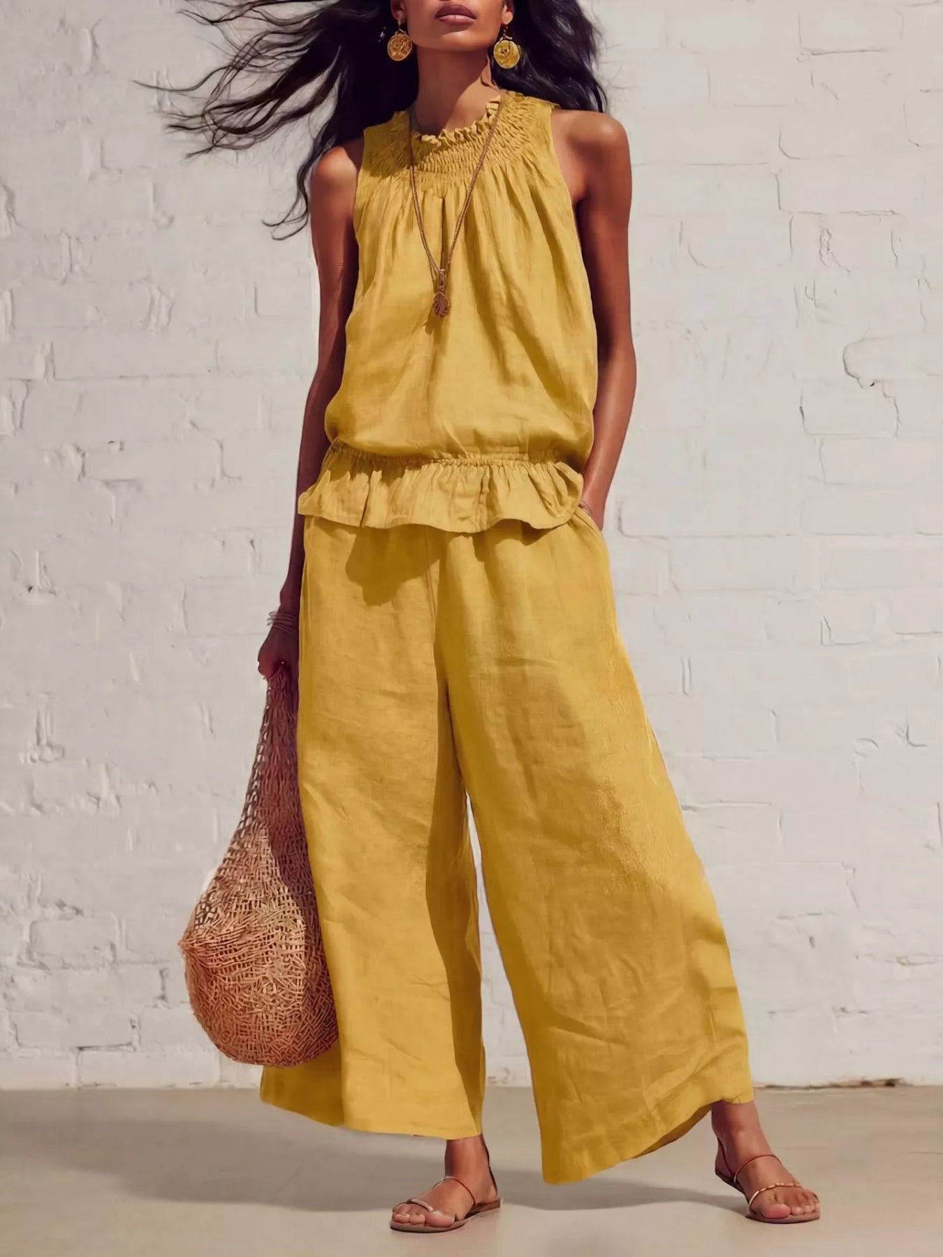 Smocked ruffled top and wide-leg pants set, yellow sleeveless with ruffled hem