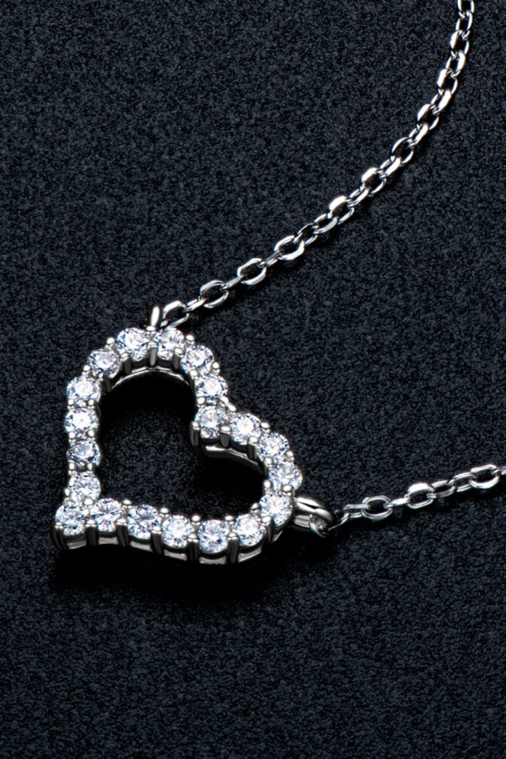 Heart-shaped pavé necklace with layered stones on a silver chain