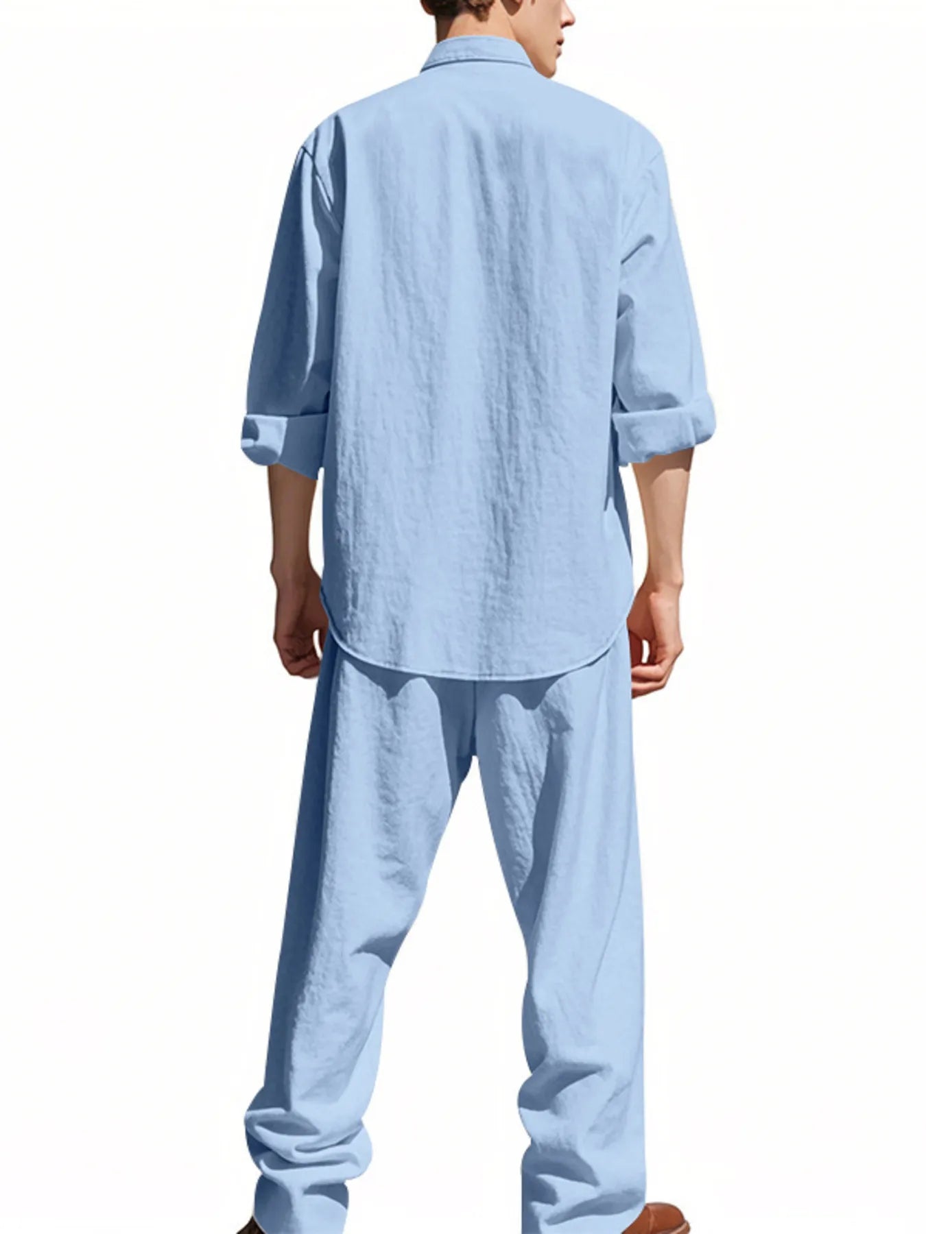 Khaki button-up shirt and pants set with long sleeves, collar, and front buttons