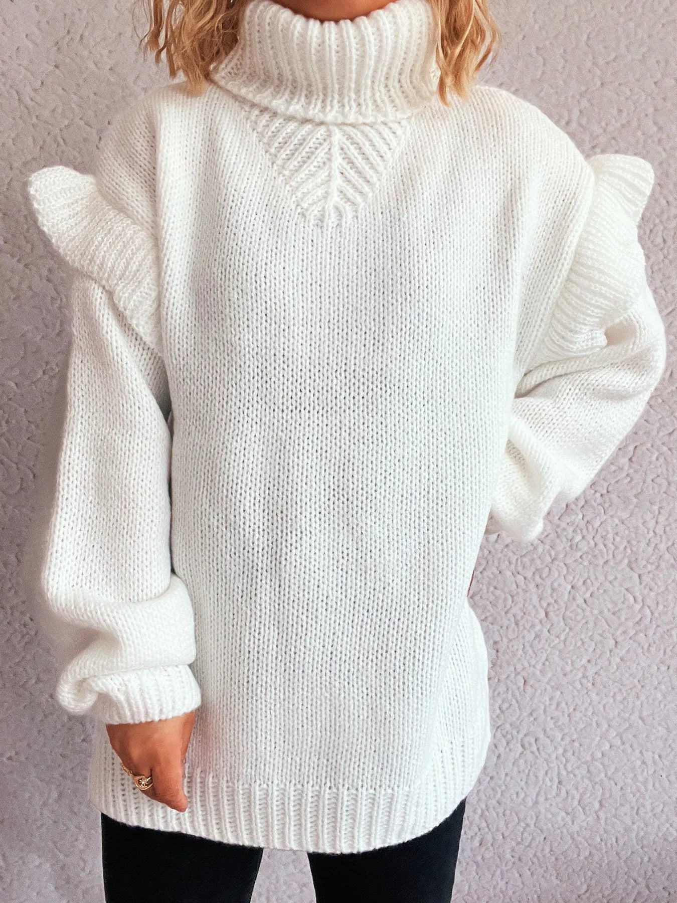 White ruffled turtleneck long-sleeve sweater with ribbed hem and cuffs