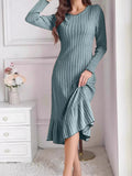 Turquoise ribbed knit bodycon dress with long sleeves and ruffle hem