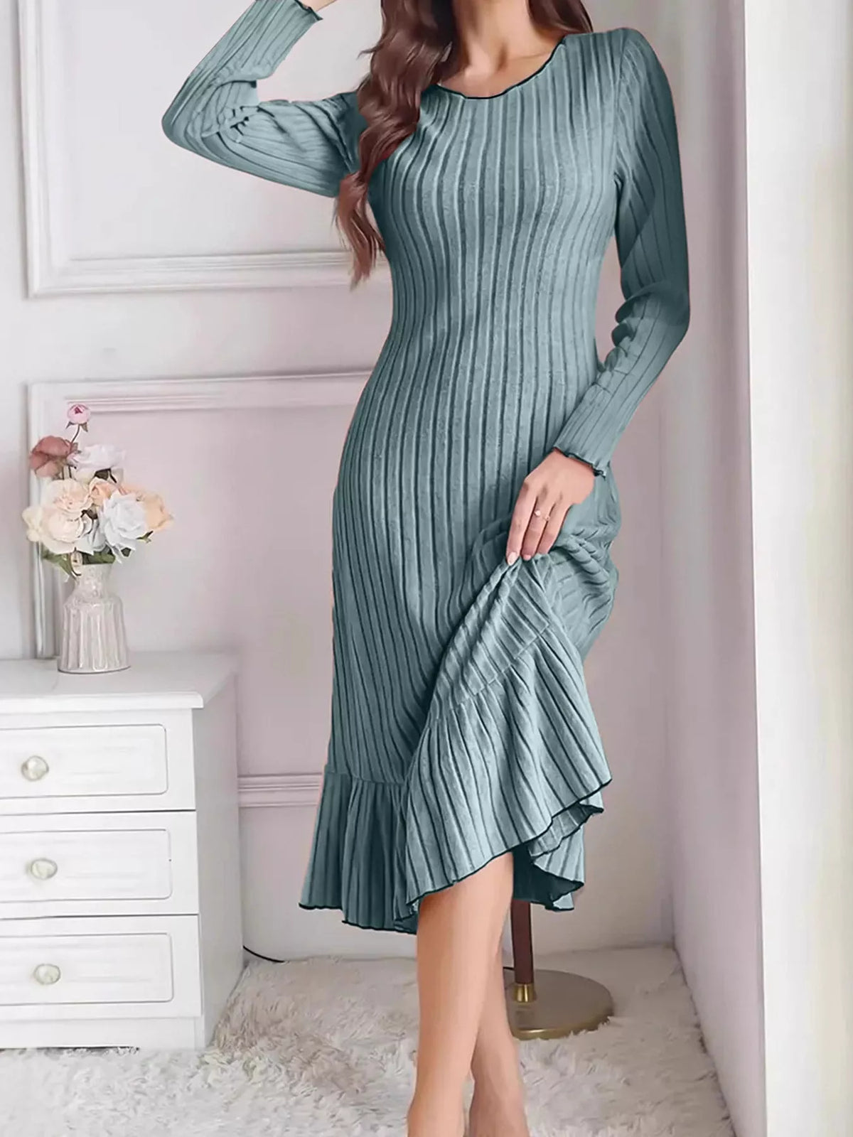 Turquoise ribbed knit bodycon dress with long sleeves and ruffle hem