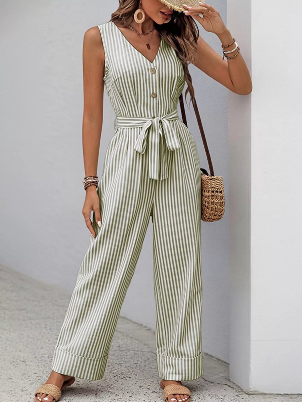 Striped sleeveless V-neck belted jumpsuit in army green and white, button front, wide-leg