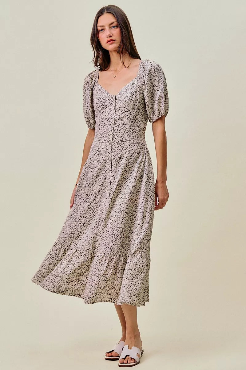 Ditsy floral maxi dress with square neckline, short puff sleeves, and elasticated waist