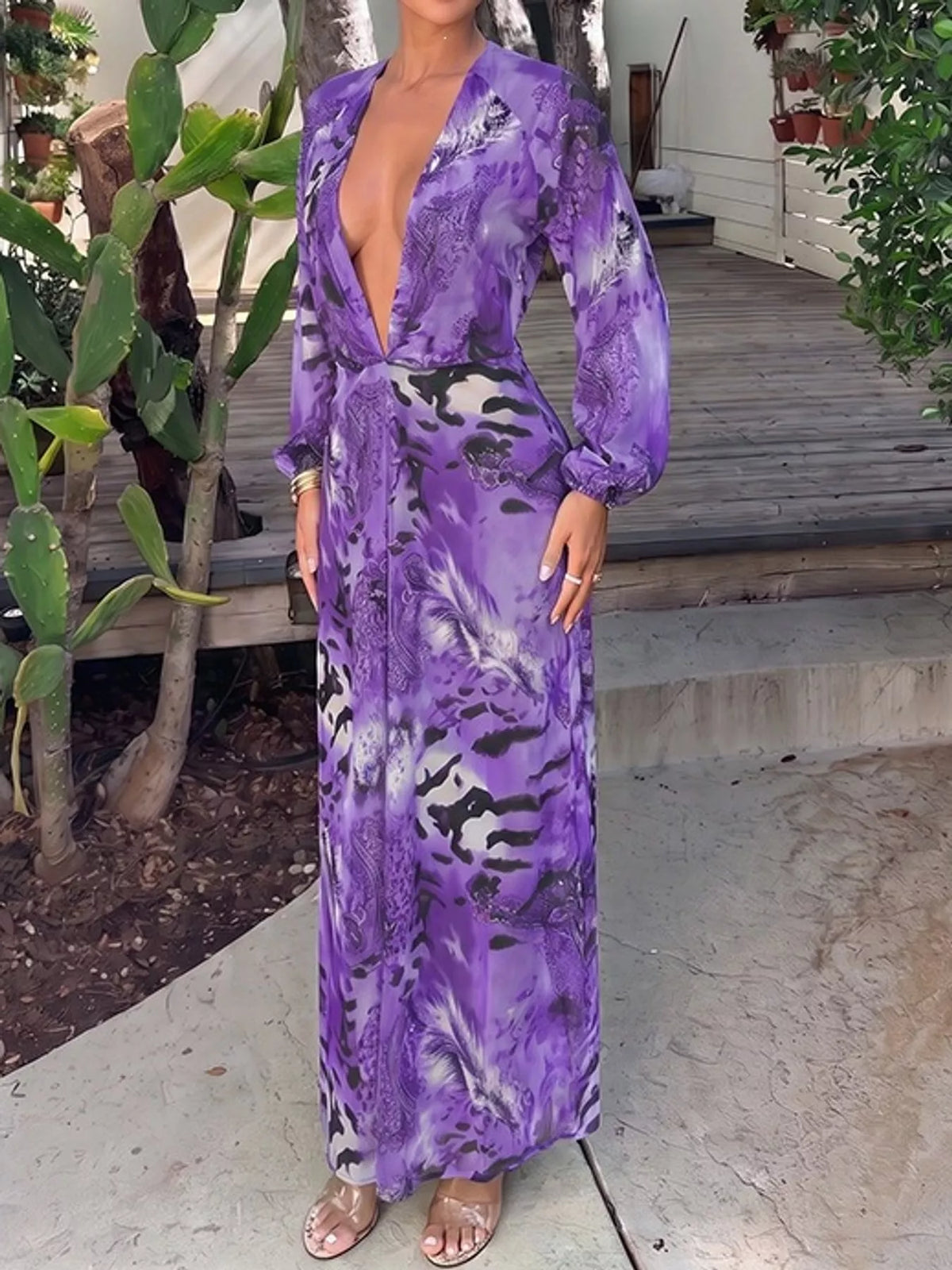 Purple printed maxi dress with deep V neckline and long loose sleeves