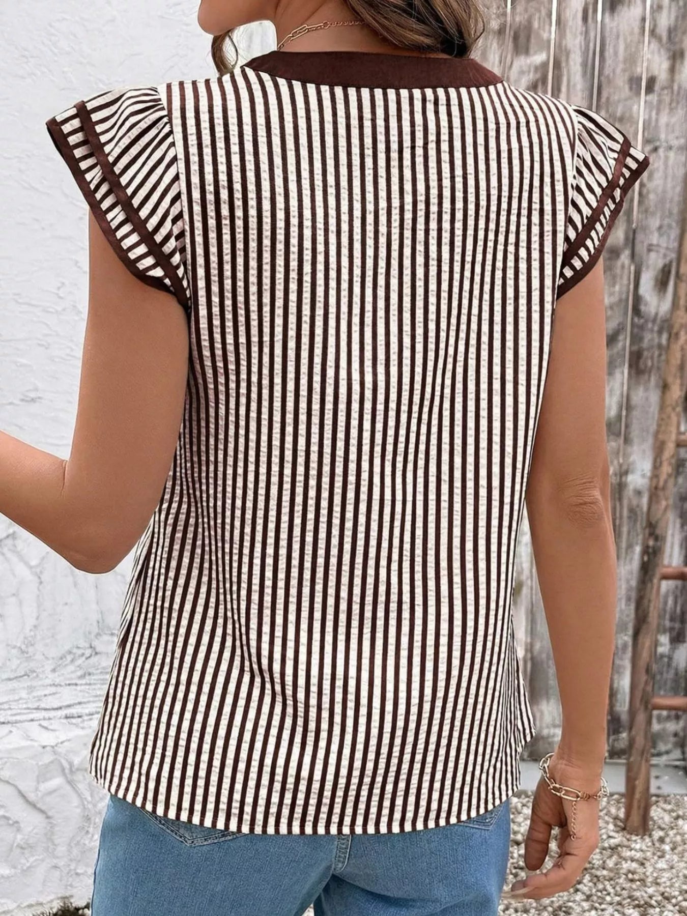 Striped ruffle-sleeve blouse by Trendsi, brown and white vertical stripes, back view
