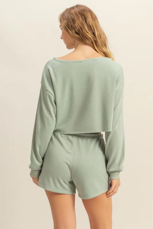 Sage green boat-neck long-sleeve cropped top, back view