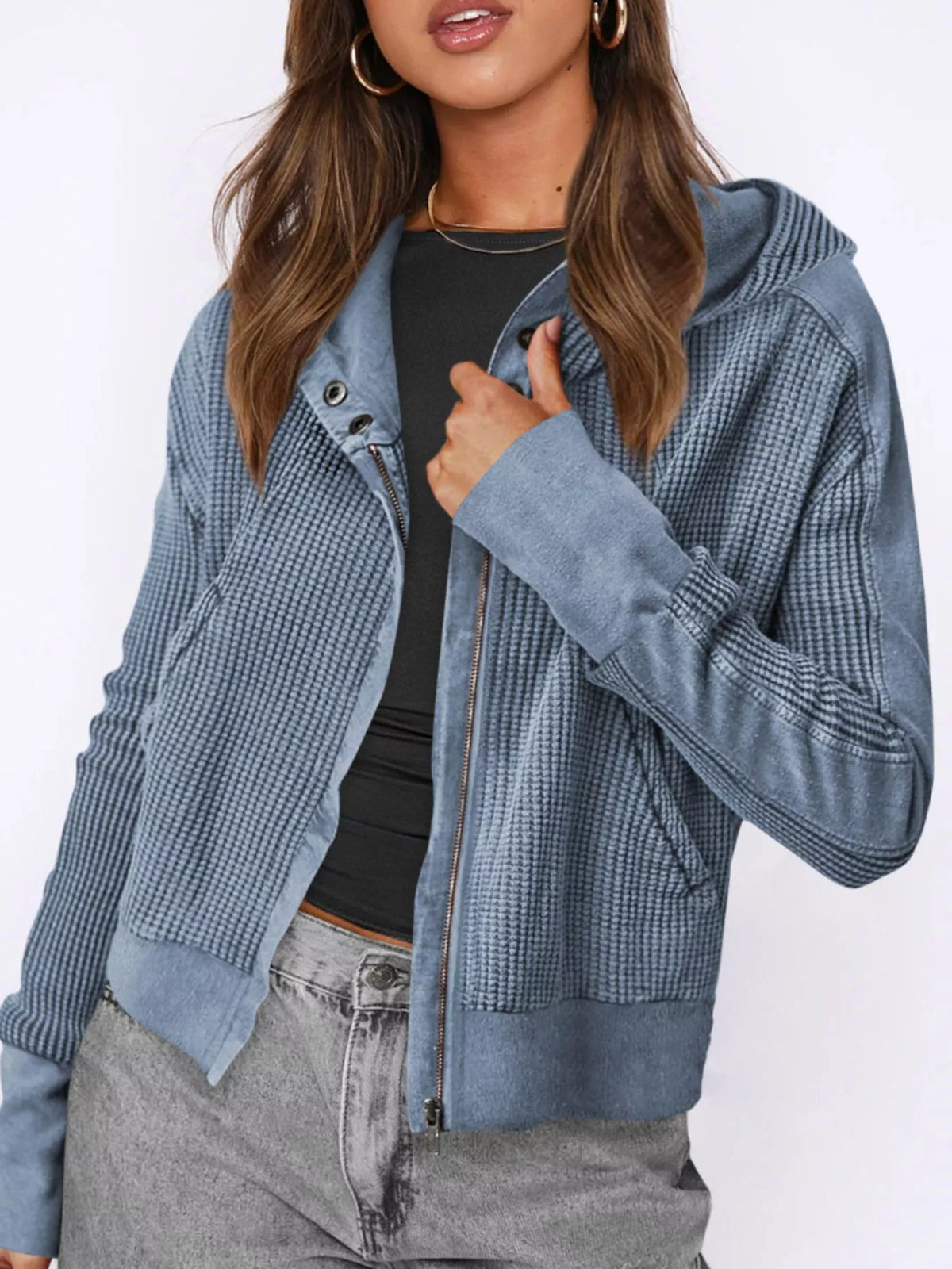 Light blue waffle knit zip-up jacket with hood, long sleeves, front zipper