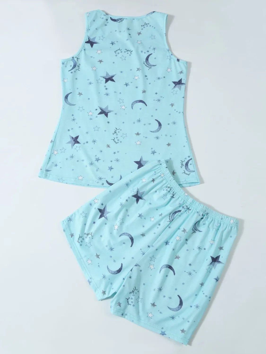 Printed round-neck lounge set in light blue with star and moon pattern, sleeveless top and shorts