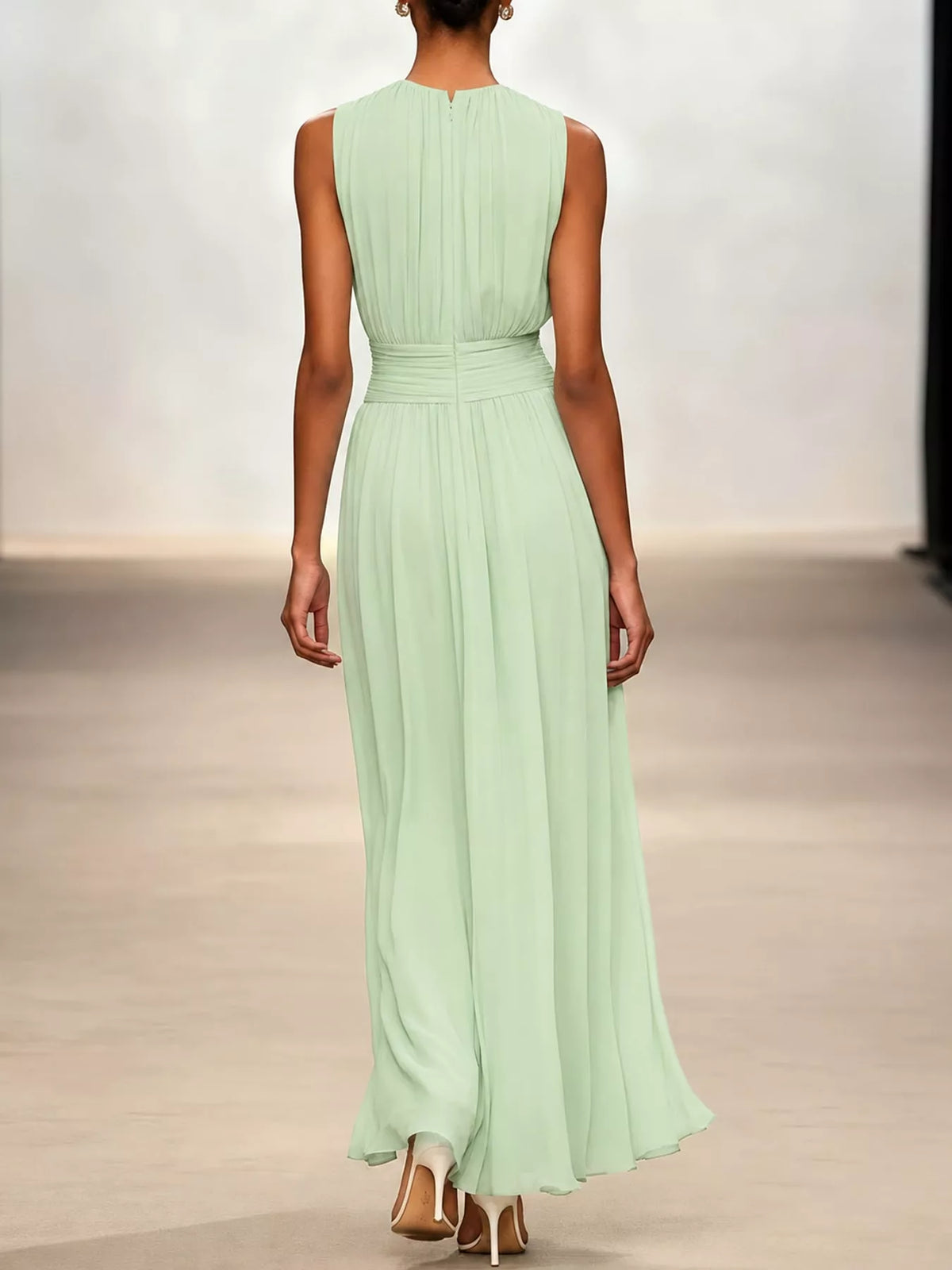 Light green sleeveless ruched chiffon maxi dress with pleated bodice and long skirt