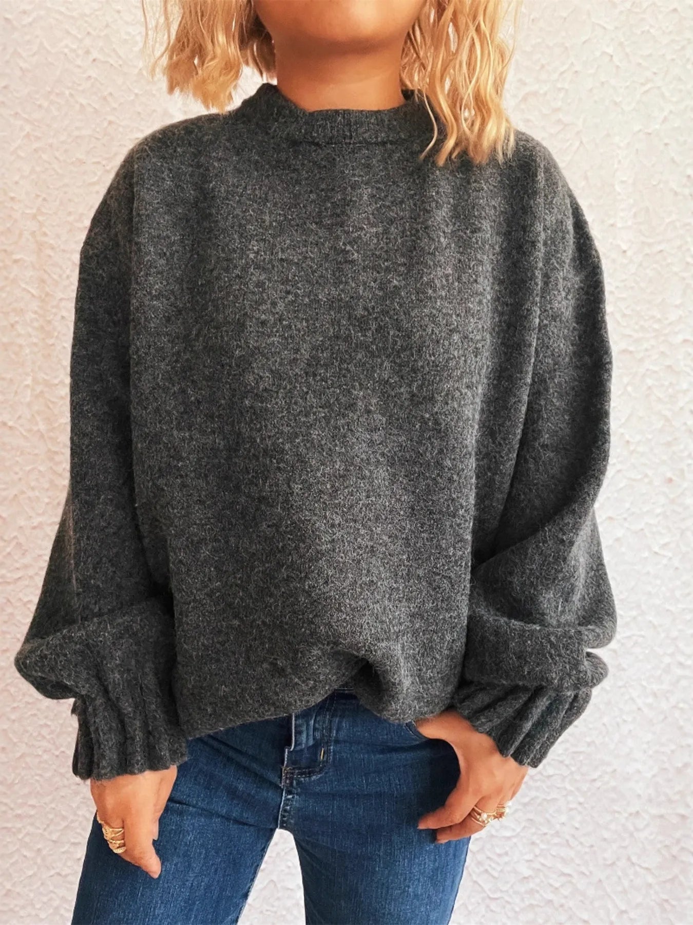 Dark gray round neck dropped-shoulder sweater with ribbed cuffs and hem