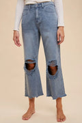 Distressed raw-hem jeans in dusty blue, cropped wide-leg with ripped knee hems