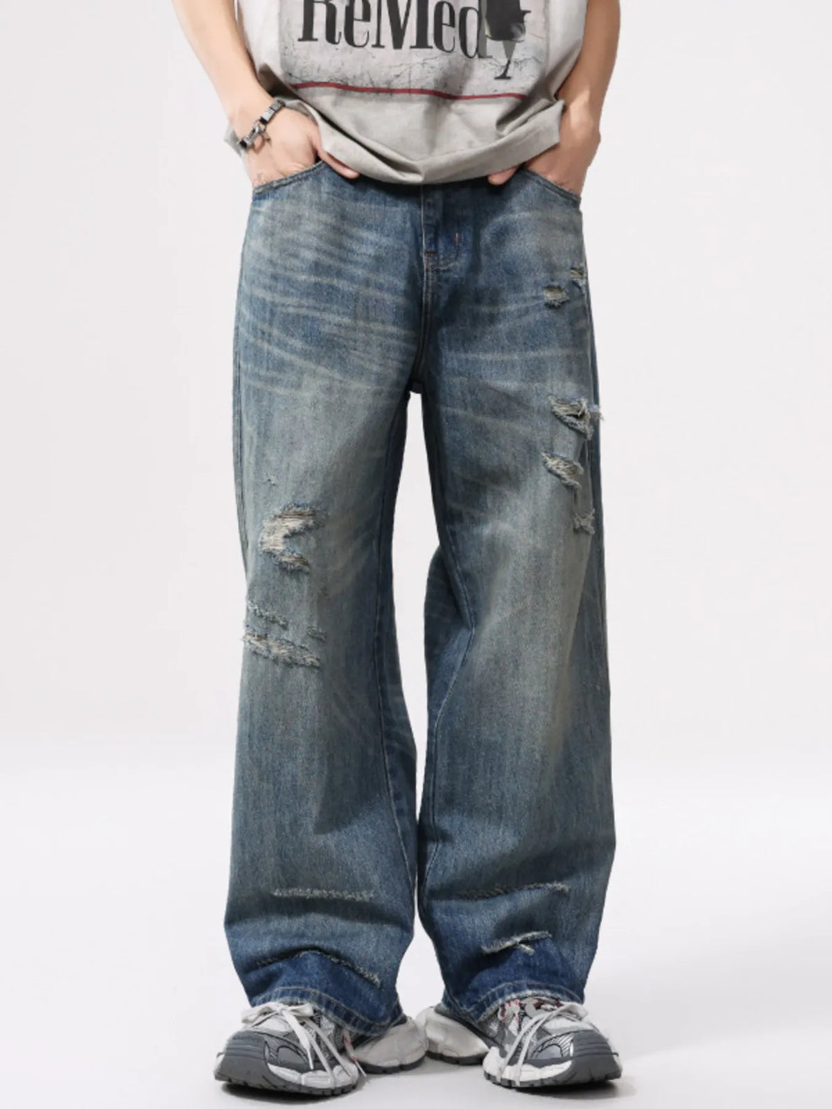 Men's wide-leg distressed washed cotton jeans, light blue with ripped patches