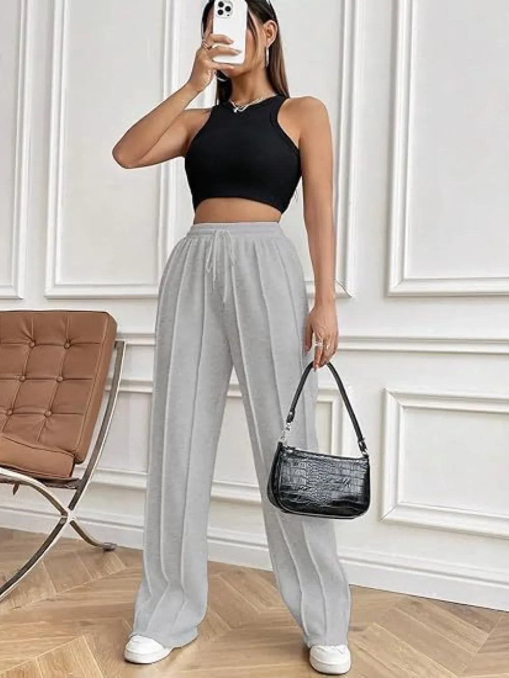 Light gray wide-leg pants with drawstring waistband and side pockets