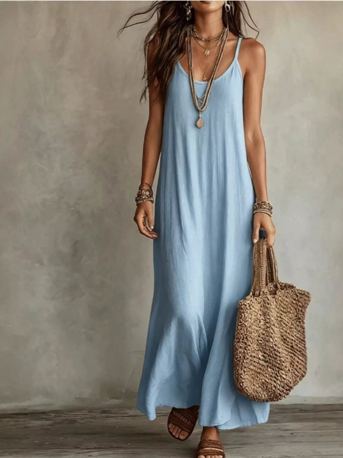 Light blue scoop-neck maxi dress with spaghetti straps and soft drape