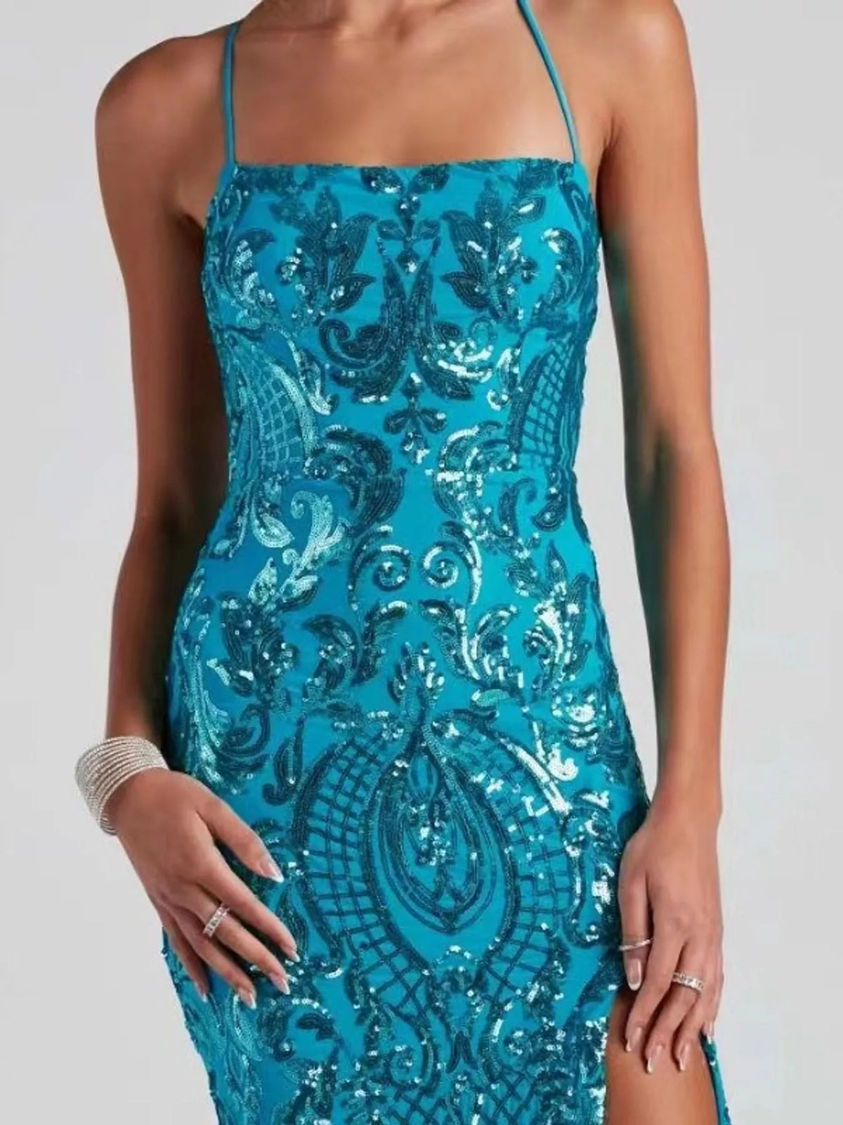 Turquoise sequin bodycon evening dress with spaghetti straps and detailed bodice