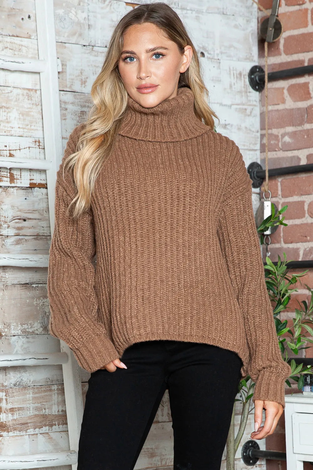 Brown turtleneck dropped-shoulder pullover sweater with ribbed hem and cuffs