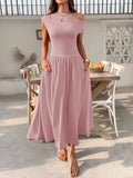 Dusty pink single-shoulder maxi dress with gathered waist and flowing skirt