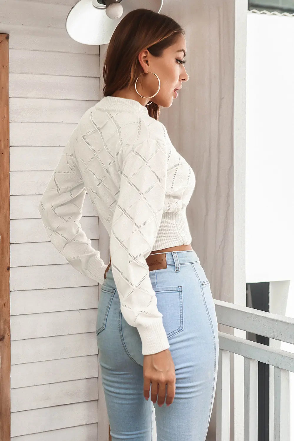 White openwork plaid knit cropped sweater, back view with diamond pattern