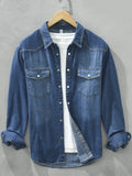 Men's washed denim button-up shirt with two chest pockets, long sleeves, dark blue