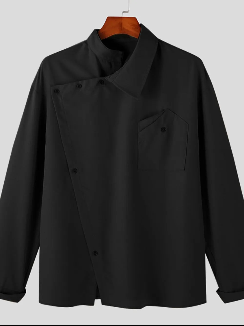 Black asymmetrical long sleeve shirt on hanger with mandarin collar and chest pocket