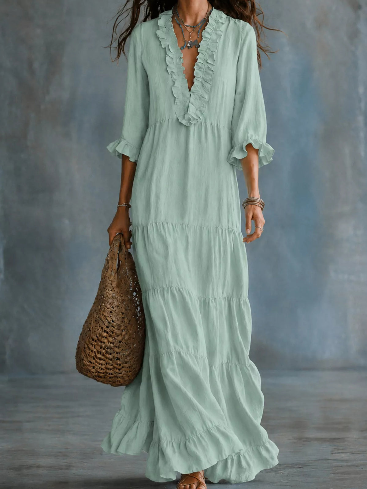 Light green ruffled V-neck tiered maxi dress with three-quarter sleeves