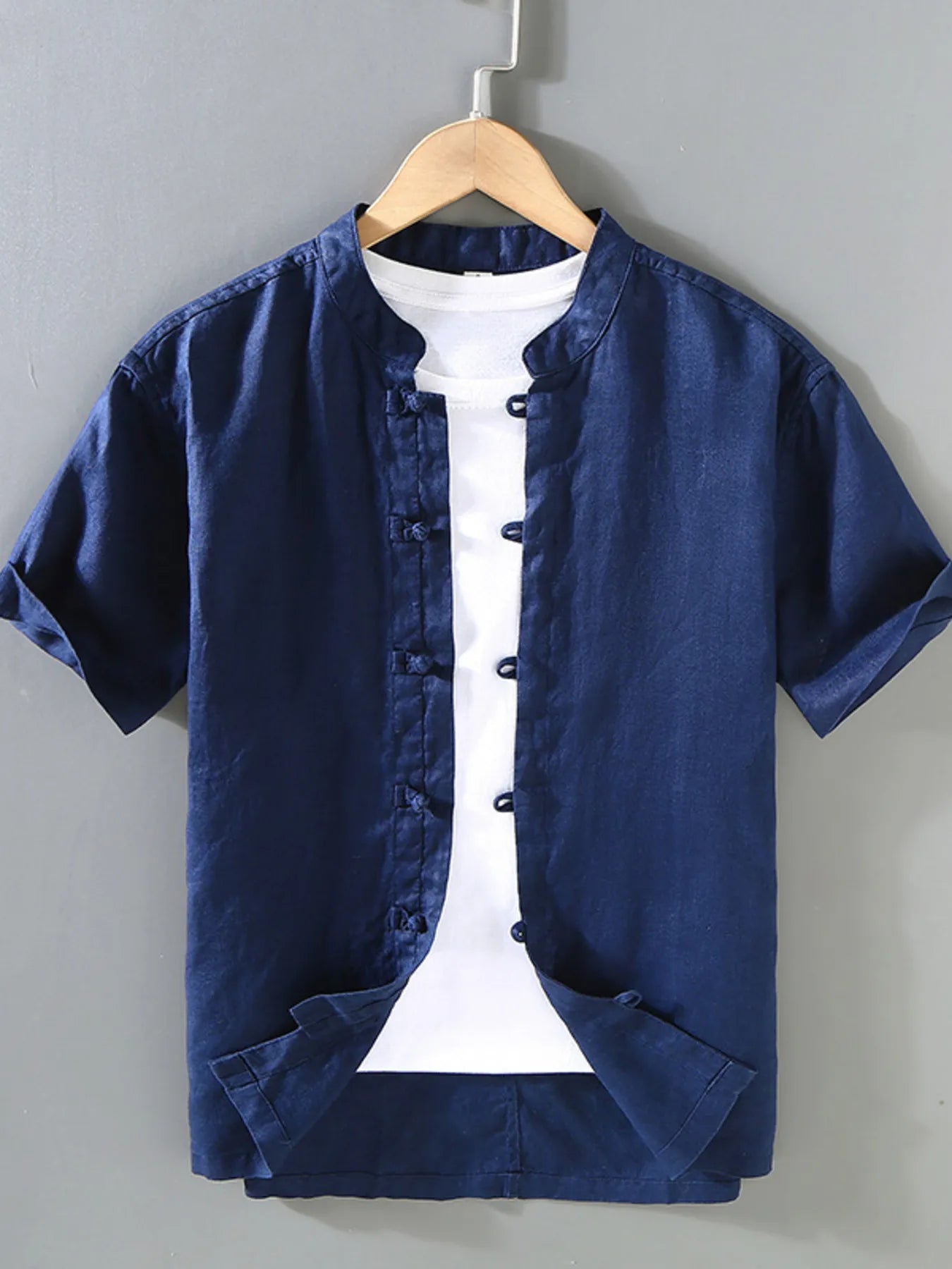 Royal blue button-up short-sleeve shirt with band collar and button front
