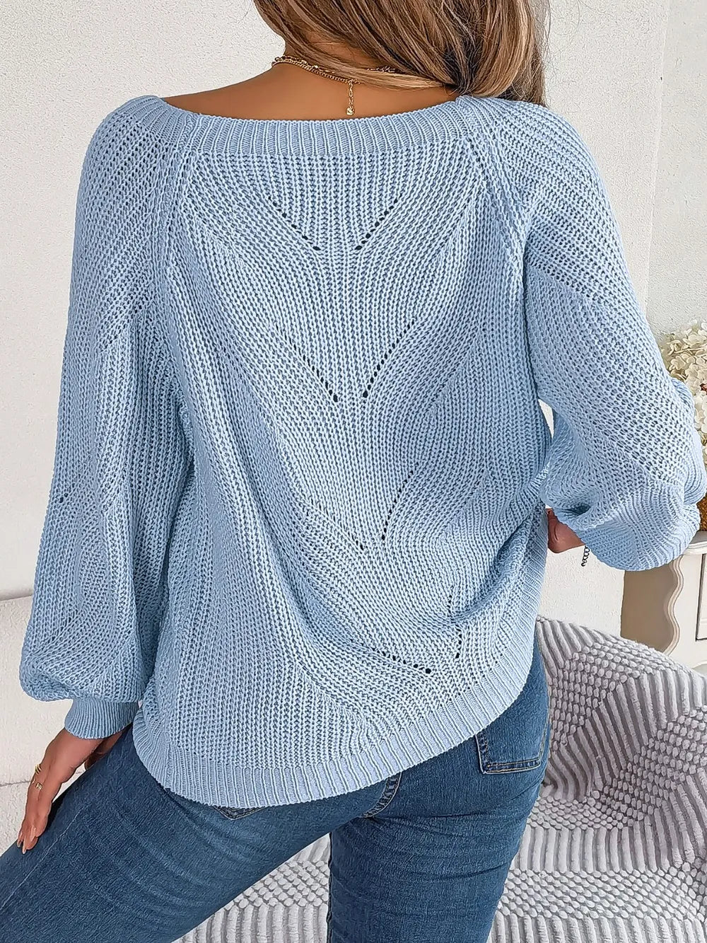 Misty blue openwork knit sweater back with diamond cable pattern and cuff buttons