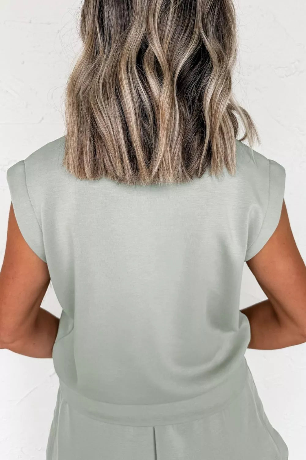 Sage sleeveless quarter-zip top and drawstring shorts set, back view