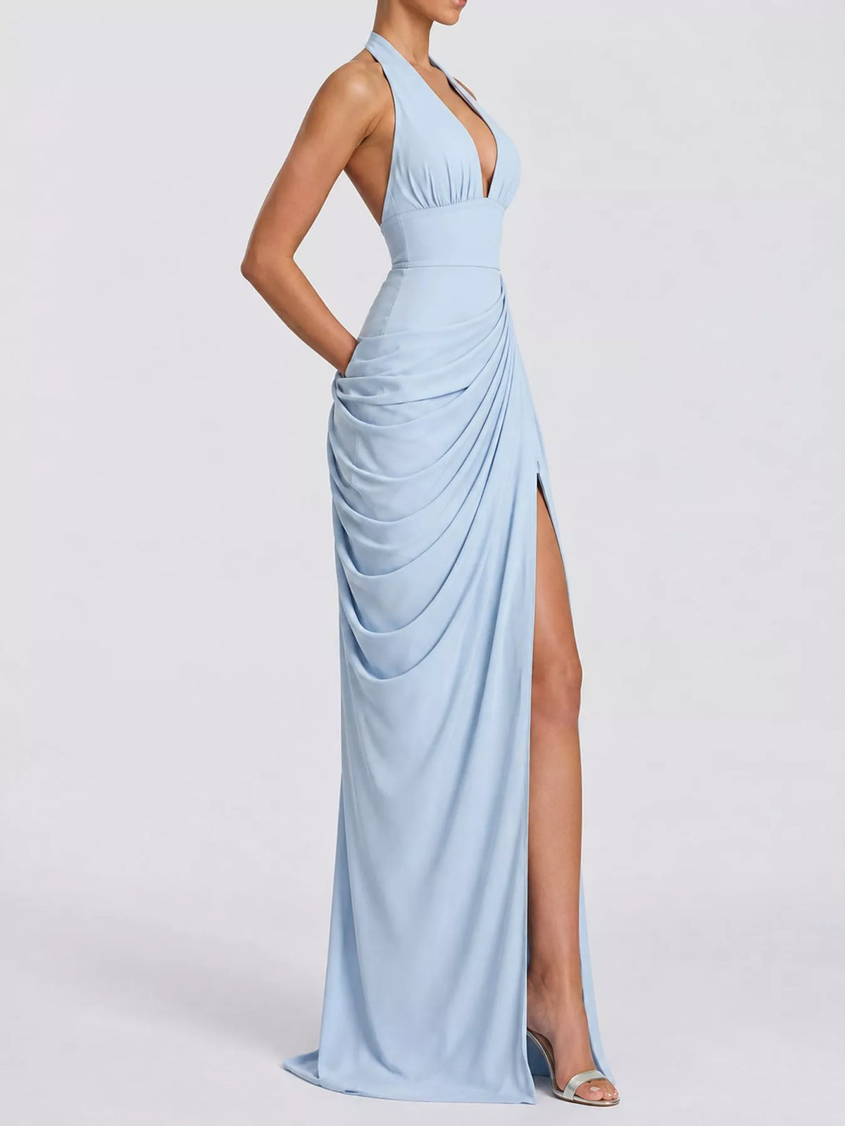Light blue halter neck maxi dress with ruched wrap design and thigh-high slit