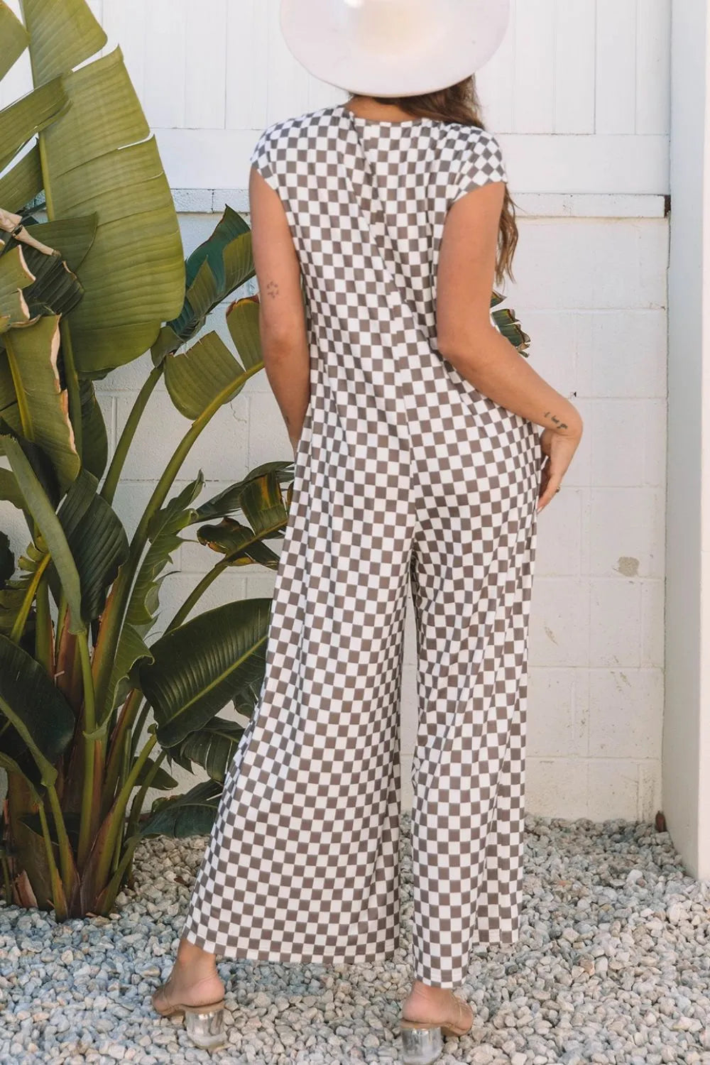 Brown-and-white checkered sleeveless crew neck wide-leg jumpsuit, full length