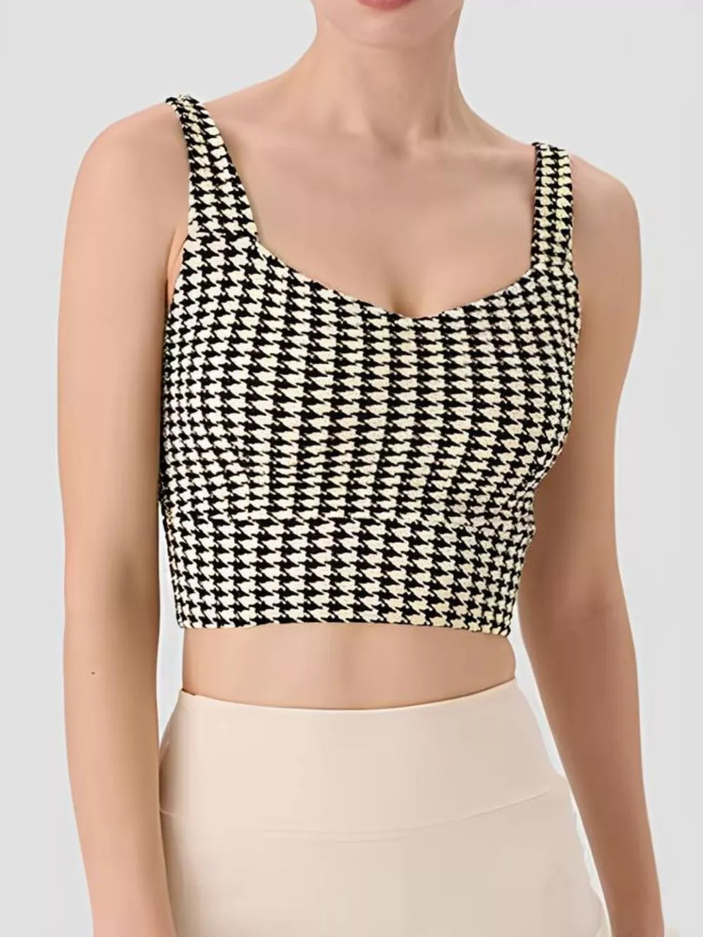 Houndstooth sports bra with square neckline and wide shoulder straps, black-and-white