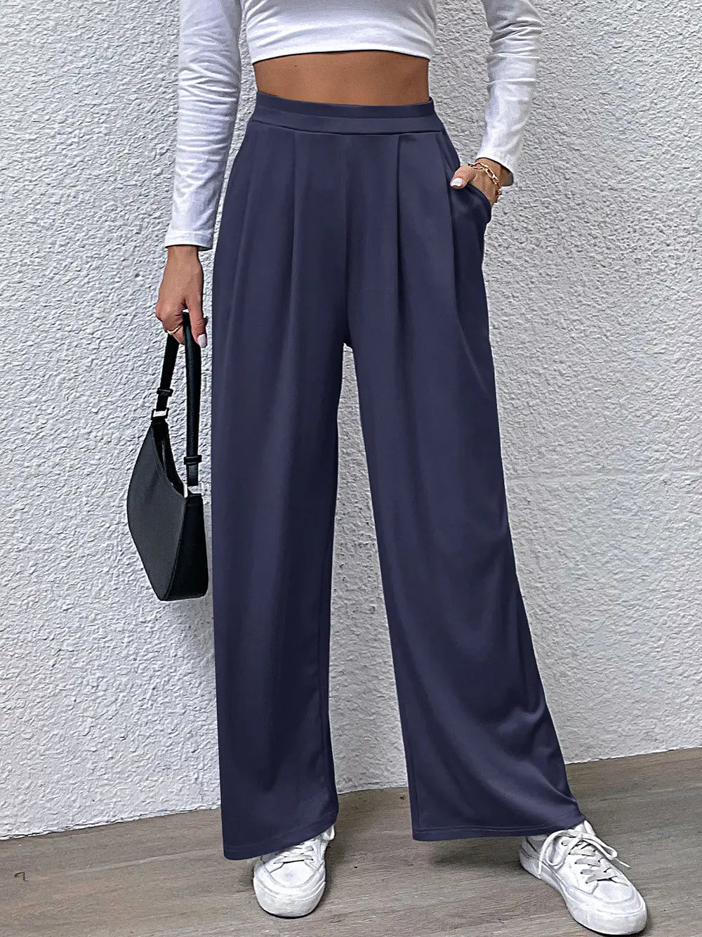 High-waist straight navy pants with pleated front and wide legs