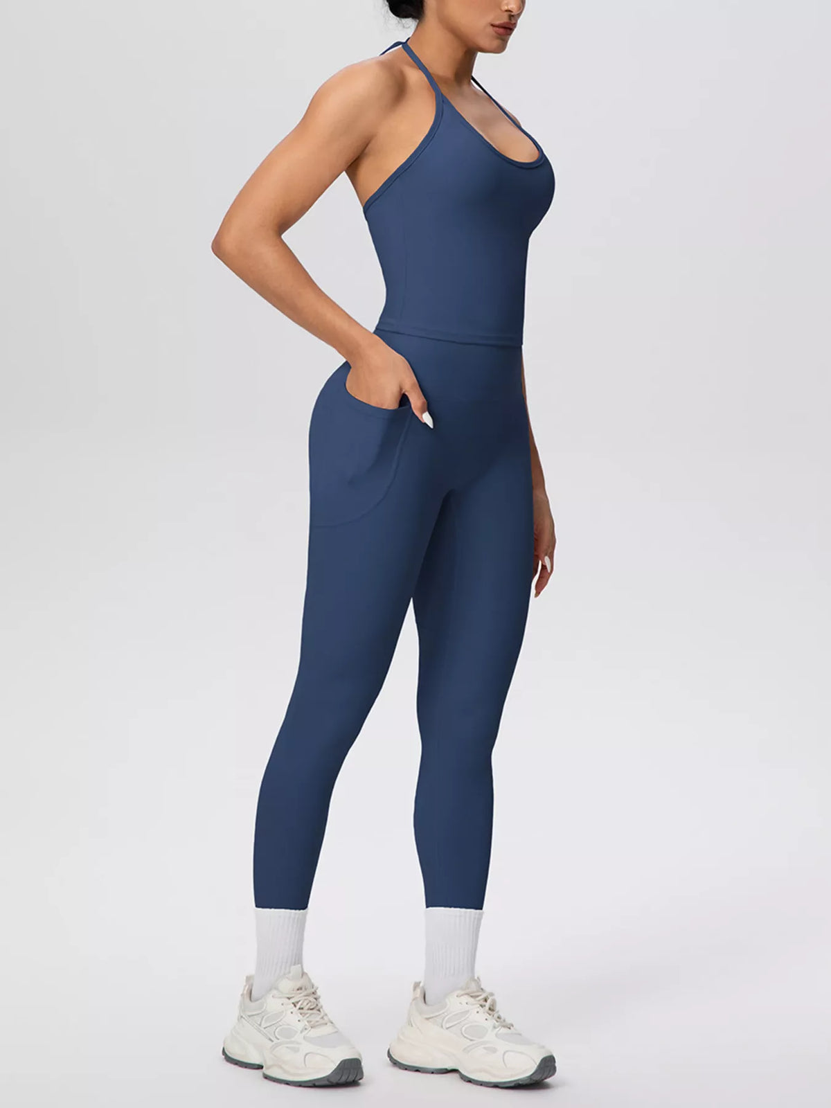 Peacock blue halter top and matching leggings set with ankle cuffs