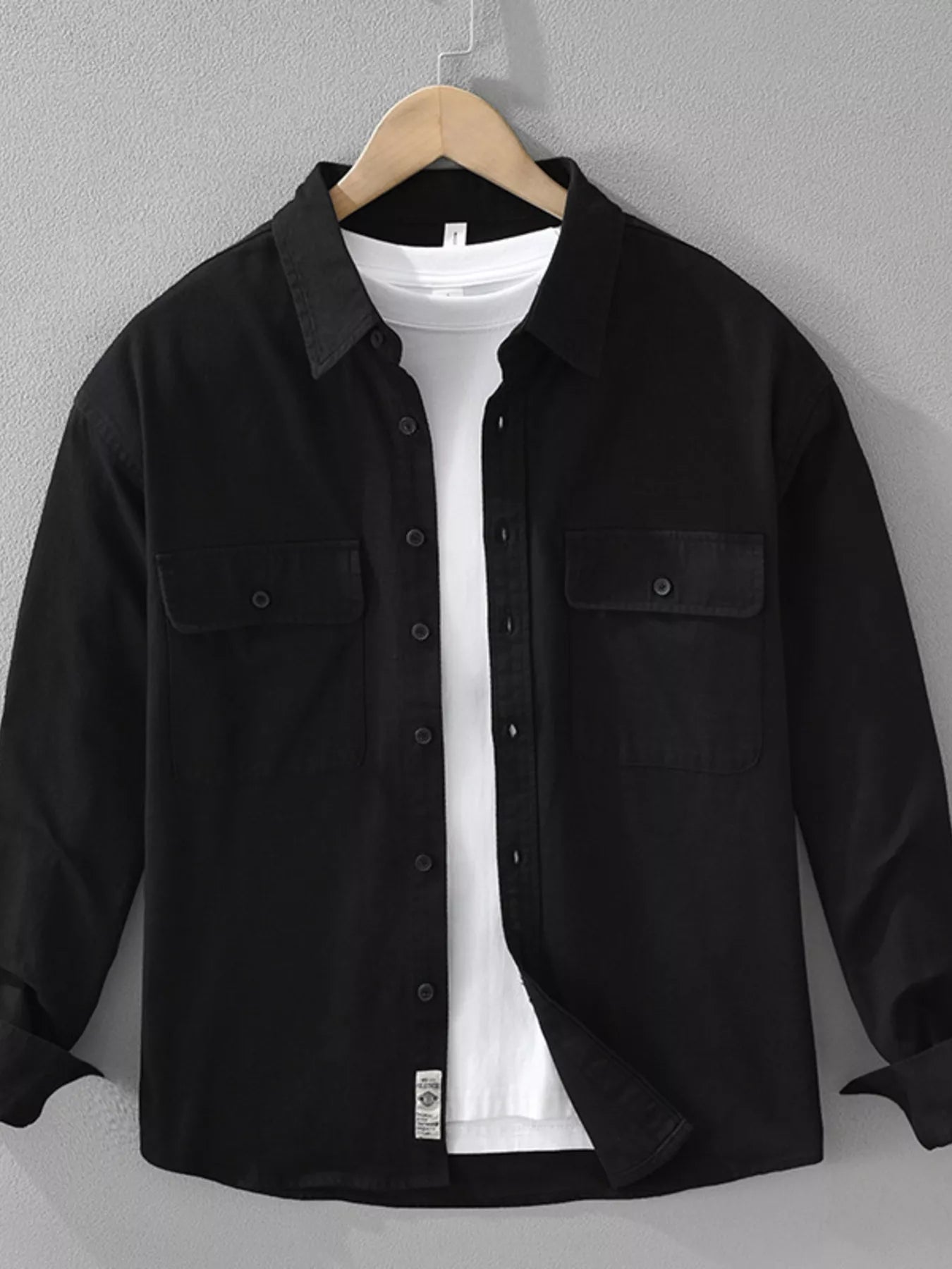 Black plus size button-up long sleeve shirt with two chest pockets