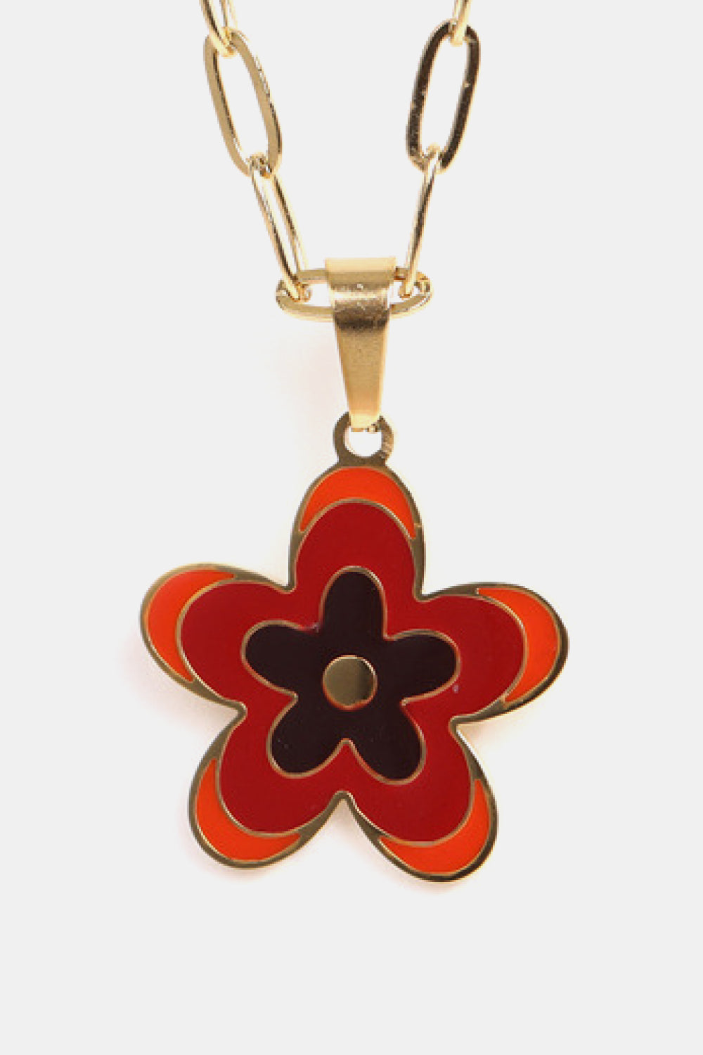 Gold-tone flower pendant necklace with red enamel petals and dark center